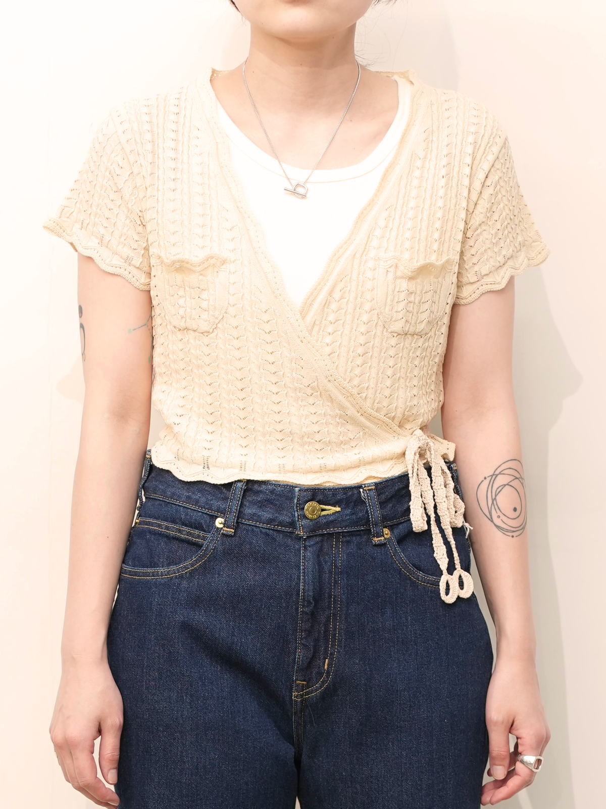 Lace knit cache-coeur top