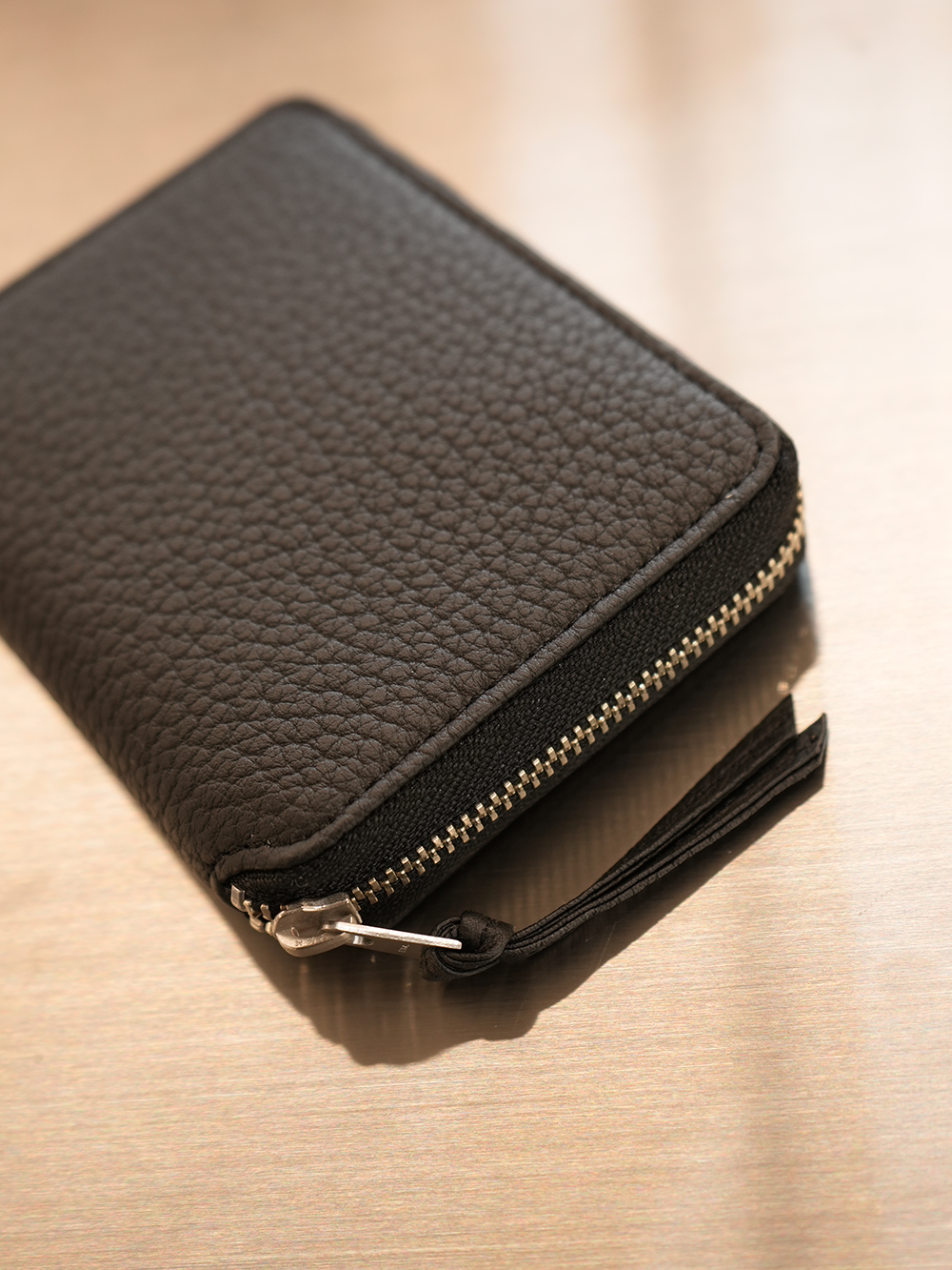 CRISPANIL ROUND PALM WALLET